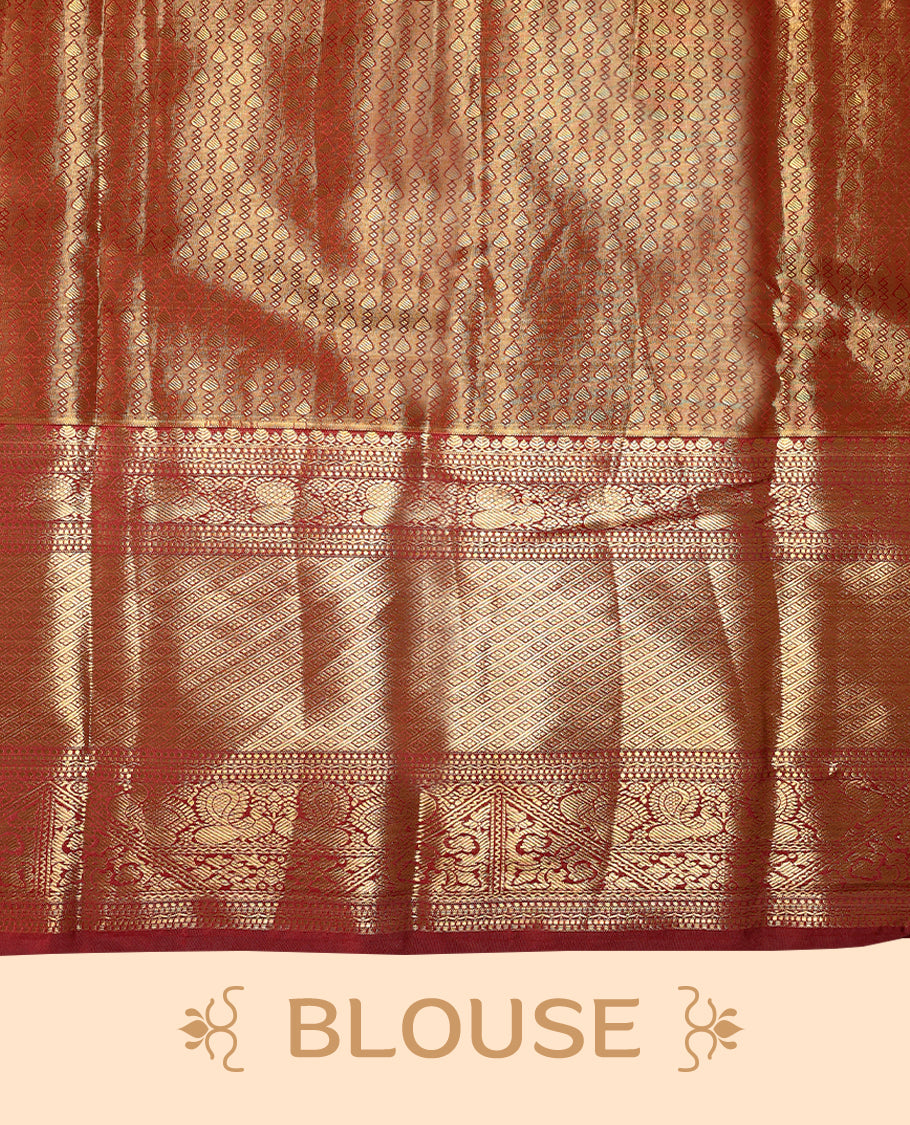 Gold colour tissue brocade saree with gold and silver zari floral design on body, gold zari peacock & Flower traditional work Maroon border, rich matching pallu with Antique zari motifs, paired with matching blouse.