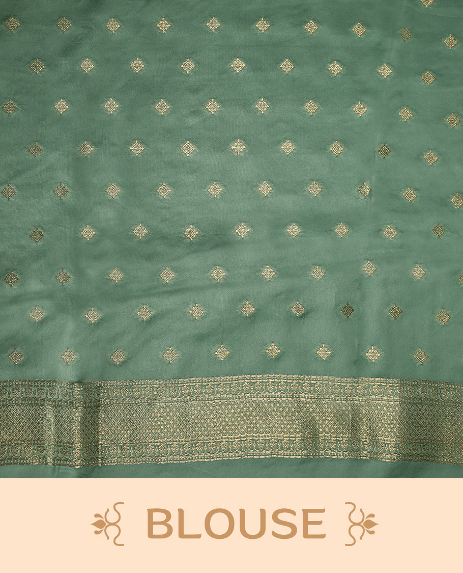 Pastel Green colour pure Banaras crepe saree showcases elegant Gold zari Flower Motifs all over the body, a traditional gold & Silver zari border, a rich intricately woven pallu, and comes with a matching blouse.