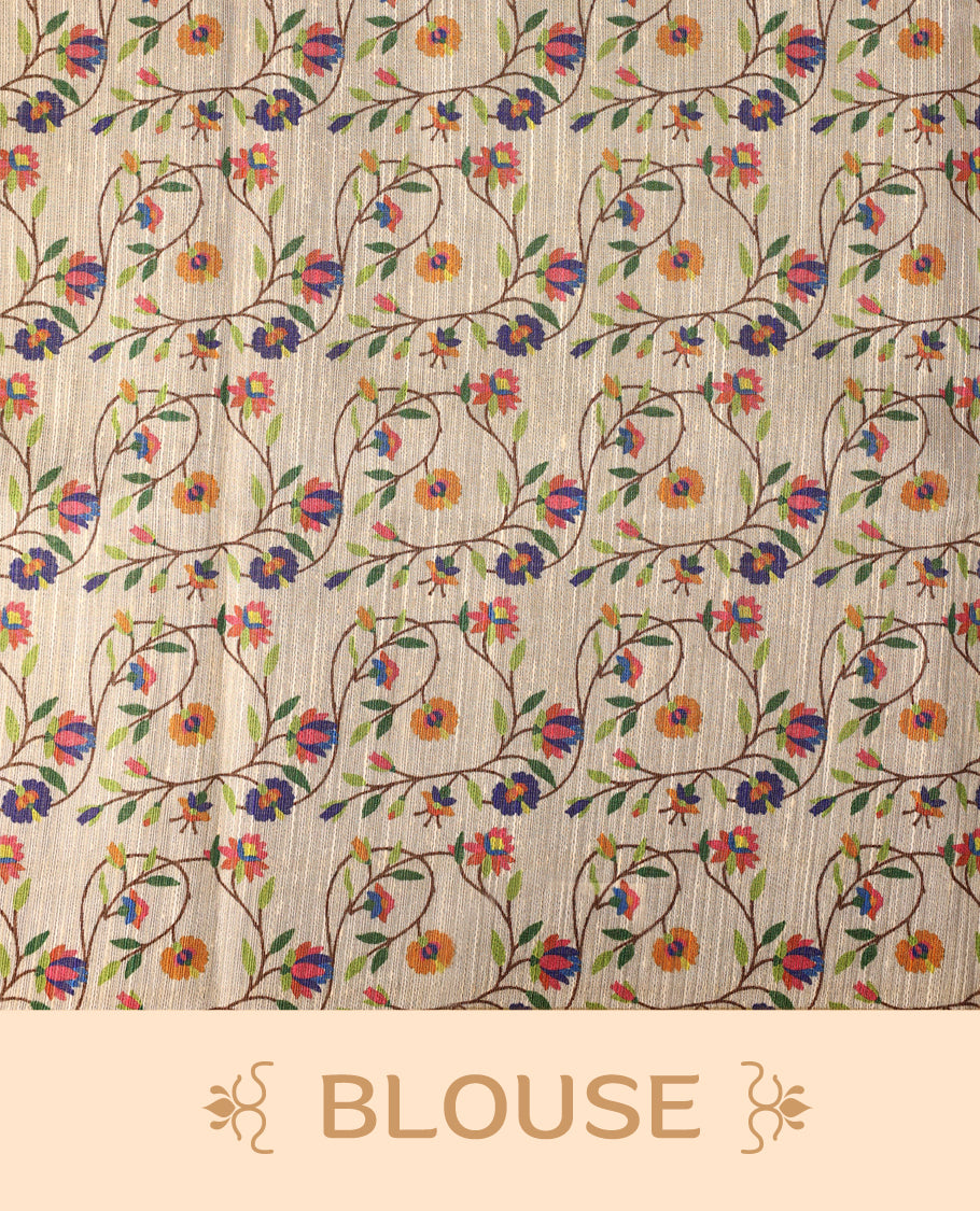 Graceful off white colour organza Kerala saree with vibrant multicolor floral embroidery and a soft golden sheen, Lightweight and elegant, ideal for festive occasions & Comes with a matching blouse piece.