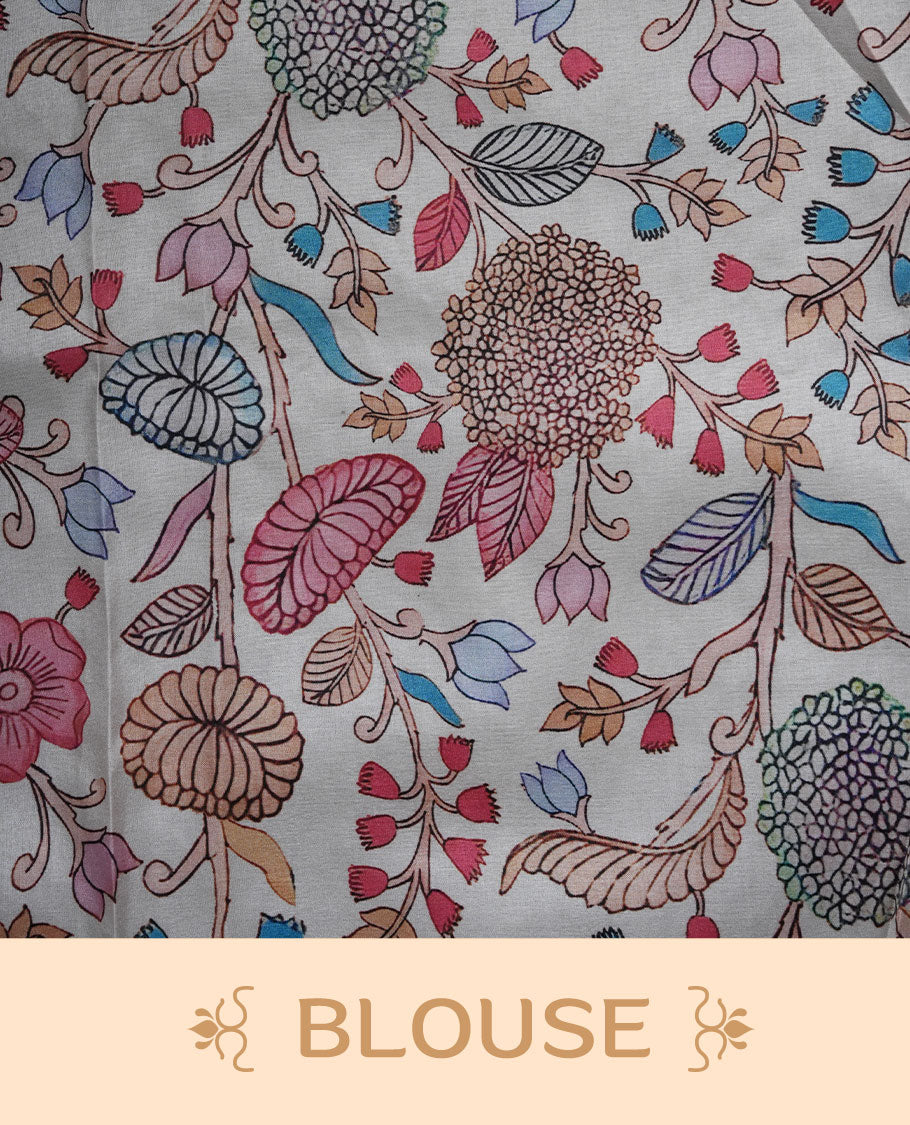 Ivory white colour organza saree featuring multicolour floral and bird printed motifs on the pallu with a subtle fine border, paired with a matching printed blouse.