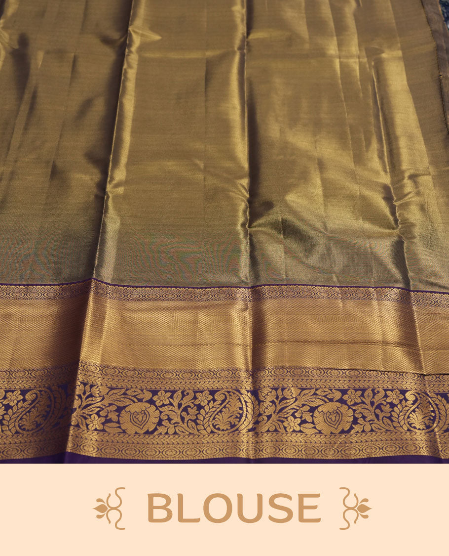 Green colour and Antique gold Zari Tissue Brocade Saree features intricate a coloured floral Motifs on body and rich violet colour with tradiional border & pallu, paired with matching blouse