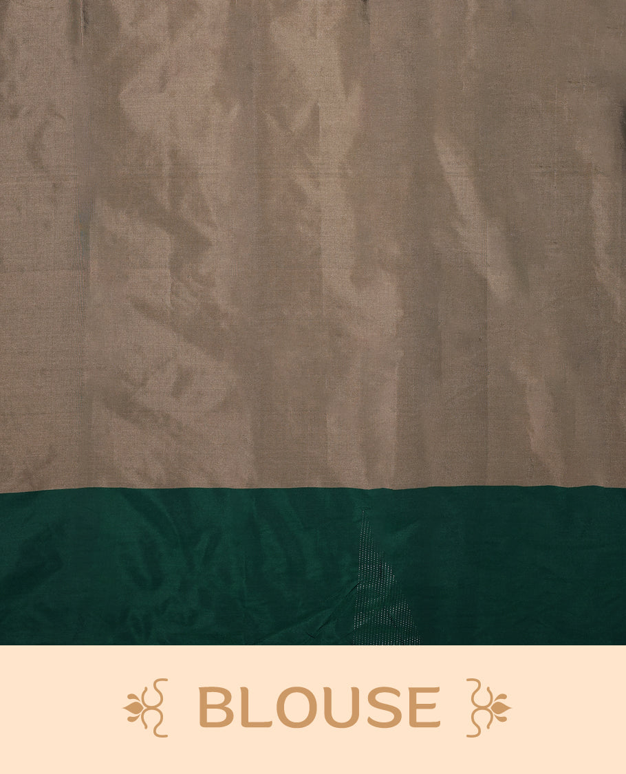 Taupe colour semi silk saree adorned with minimal geometric weave detailing, enhanced by a deep emerald green border, comes with a matching blouse.