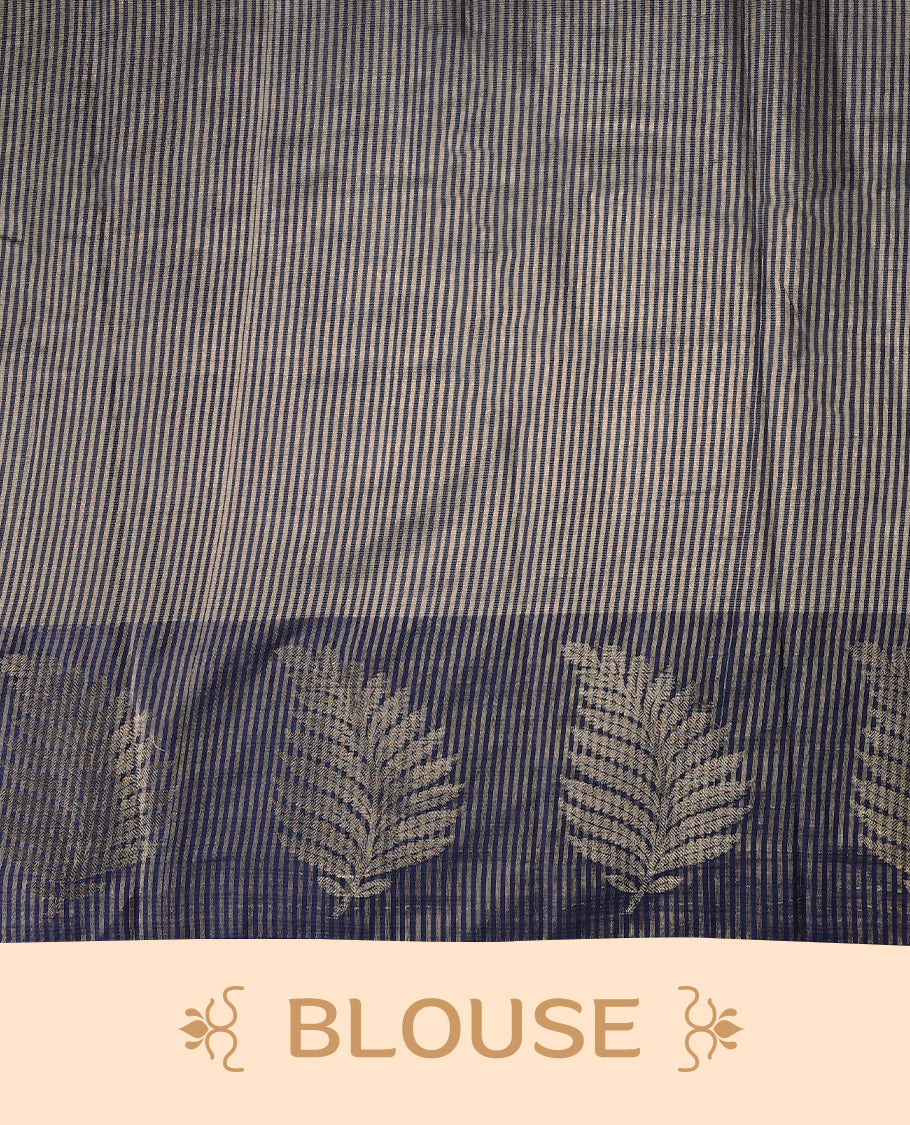 Navy Blue Colour Semi Tussar Silk saree featuring golden zari horizontal lines across the body, adorned with bold Leaf motifs on the border, paired with a matching blouse.