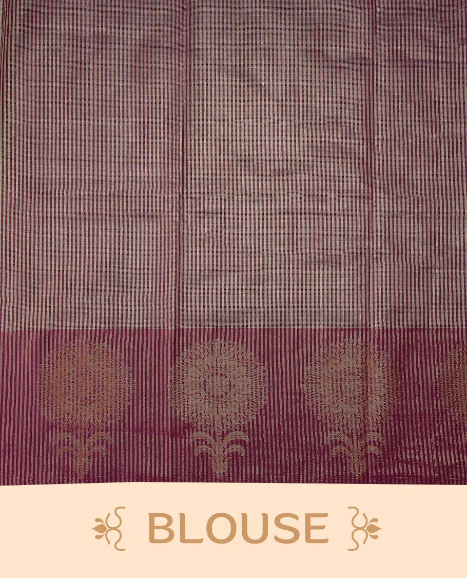 Dark Maroon Colour Semi Tussar Silk saree featuring golden zari horizontal lines across the body, adorned with bold floral motifs on the border, paired with a matching blouse.