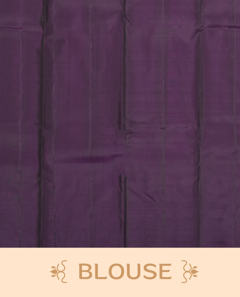 Deep violet colour semi soft silk saree featuring a self coloured textured patterned body, complemented by self coloured motifs on pallu & border and a matching blouse piece.