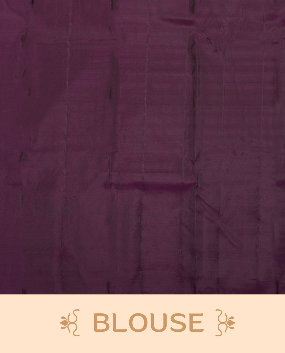 Dark wine colour semi soft silk saree featuring a self coloured textured patterned body, complemented by self coloured motifs on pallu & border and a matching blouse piece.