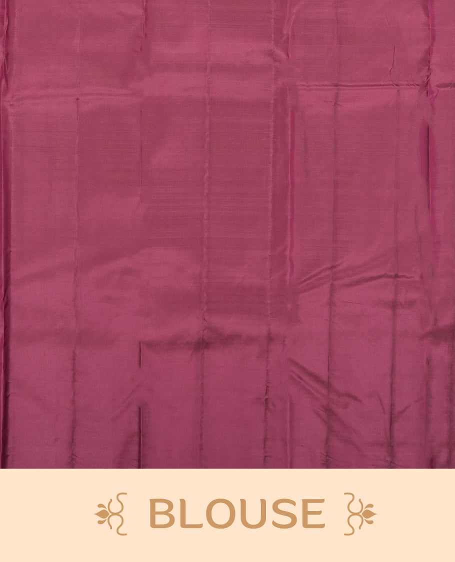 Wine colour semi soft silk saree featuring a self coloured textured patterned body, complemented by self coloured pallu & border and a matching blouse piece.