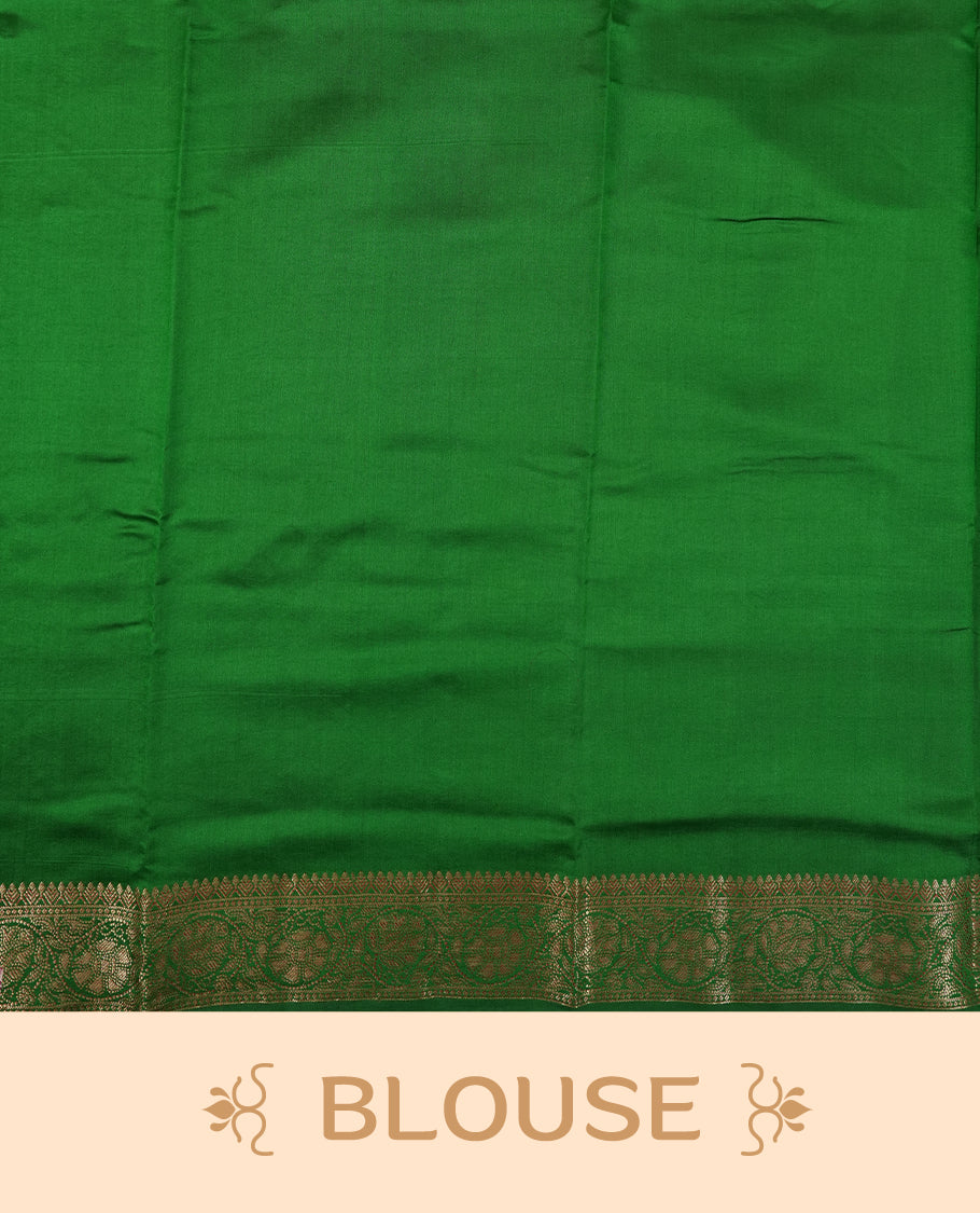 Golden Yellow Colour Banaras Soft Silk Saree with Gold Zari Textured Oval Buttas, Simple Decorative Pallu Border, Pallu with Ornate Floral and Foliate Motifs in Green and Gold Tones, and Matching Forest Green Blouse.