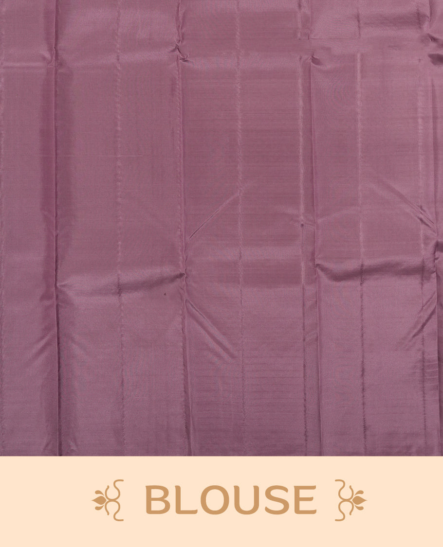 Medium grape colour semi soft silk saree featuring a self coloured textured patterned body, complemented by self coloured Square motifs on pallu & border and a matching blouse piece.