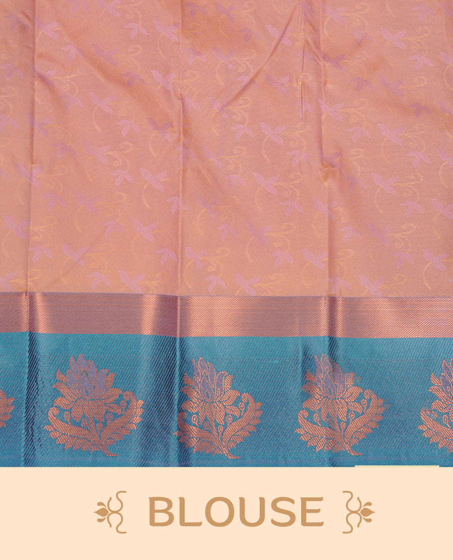 Sandalwood colour Semi silk saree featuirng Cream colour patterns on body, complemented by contrast Green colour with gold zari border, paired with matching blouse piece.