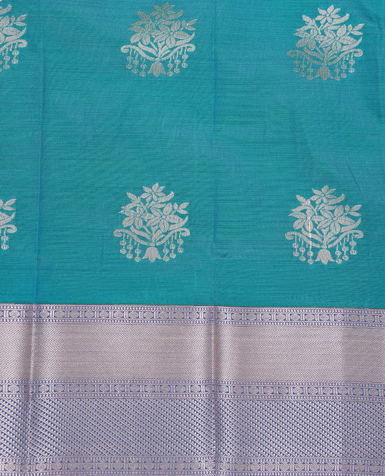 Green colour Semi silk saree Featuring gold zari motifs on body, complemented by contrast Peacock colour with gold zari border, paired with matching blouse piece.