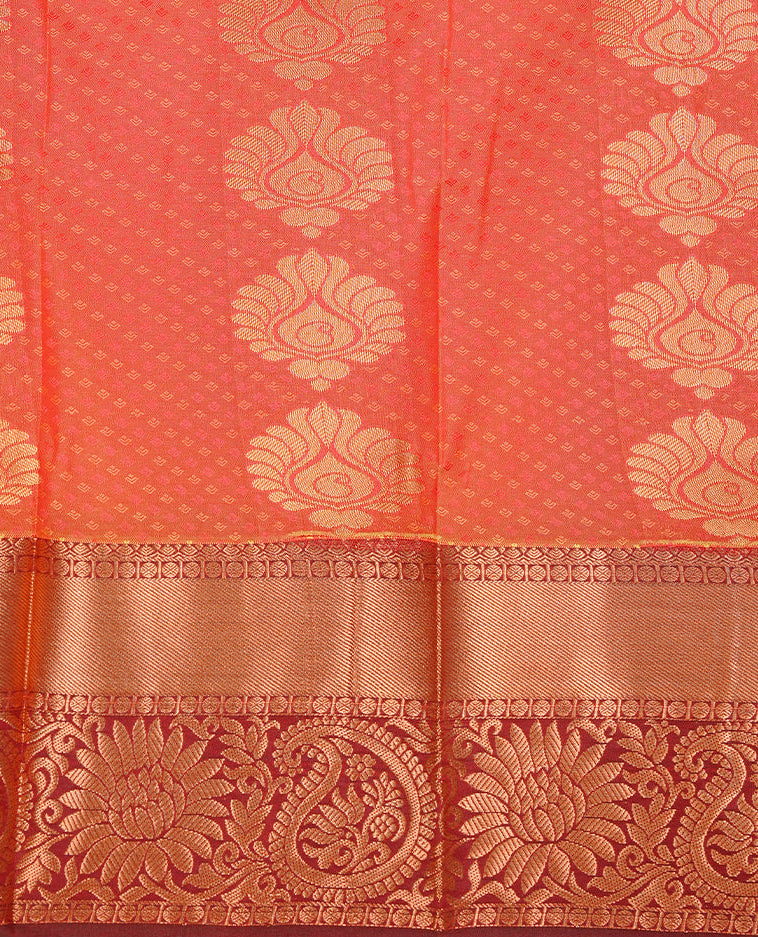 Rust Orange colour Semi silk saree Featuring gold zari motifs on body, complemented by contrast Maroon colour with gold zari border, paired with matching blouse piece.
