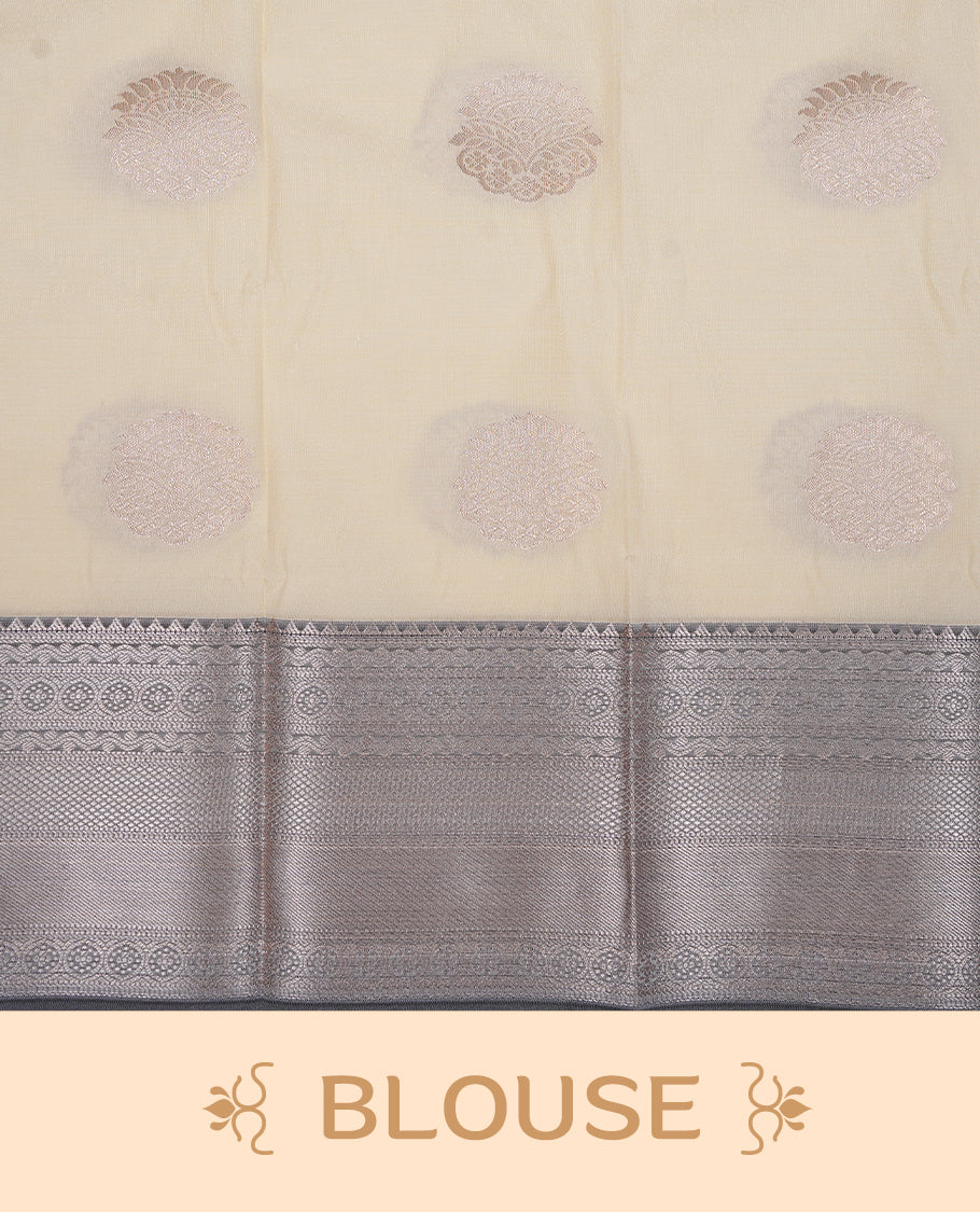 Cream colour Semi silk saree Featuring gold zari motifs on body, complemented by contrast Grey colour with gold zari border, paired with matching blouse piece.