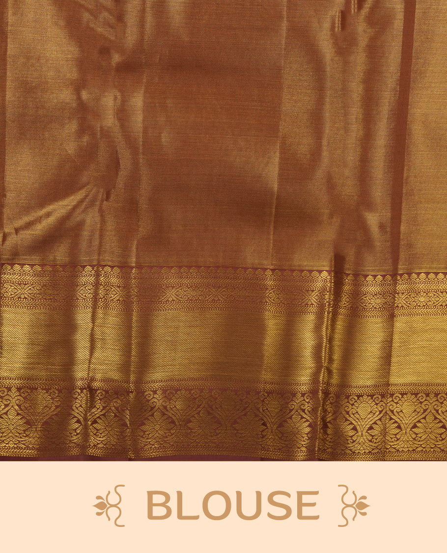 Pinkish beige & goldcolour kancheepuram tissue silk saree highlighting gold floral zari pattern body, with contrast Pinkish beige colour colour with traditional border and paired with matching blouse.