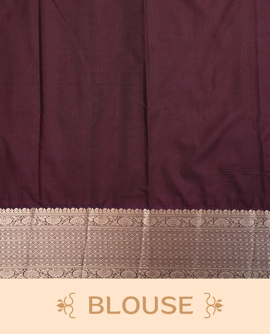 Cream colour semi wedding saree featuring gold zari floral kode pattern on body, complemented by contrast burgundy with traditional border, paired with matching blouse piece.