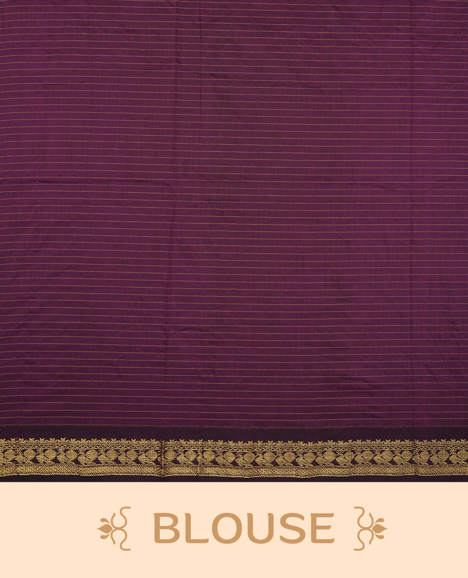 Mustard Yellow coloured mixed Kalyani cotton saree featuring golden zari checks on the body, complemented by a dark purple coloured border and pallu adorned with golden zari patterns, Paired with a matching blouse.