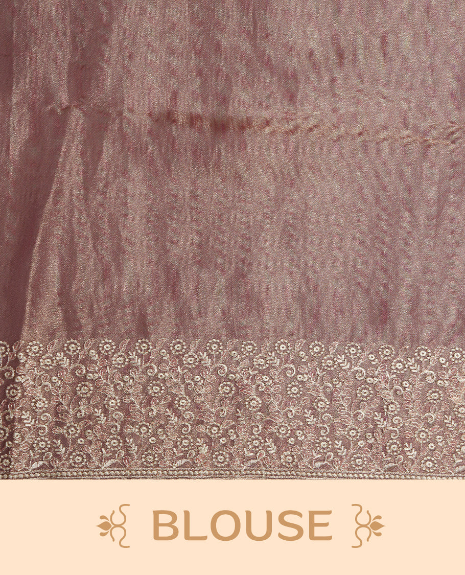 Pastel Pink colour net organza saree featuring white thread embroidery motifs on body and  thread detailing on the border and paired matching blouse.