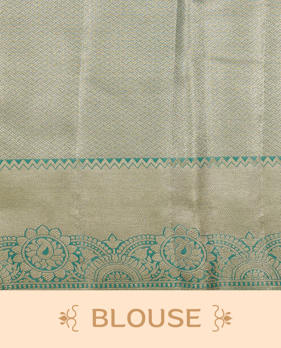Light Green colour Tissue saree featuirng Green, Gold, silver zari Scales design on body, complemented by traditional border on self colour, paired with matching blouse piece.