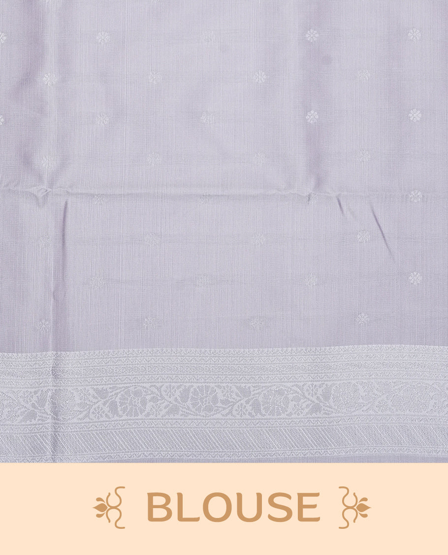 Light purple colour semi silk saree featuring Silver zari Geometric pattern on body, complemented by contrast Lavender colour with silver zari border, comes with matching blouse piece.