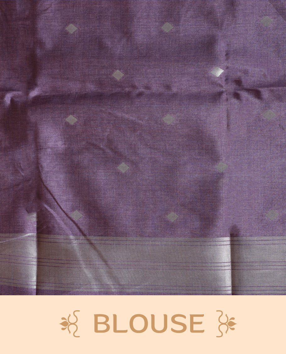 Olive and silver colour dual tone semi tussar saree featuring woven abstract geometric motifs on the body, complemented by a ikat inspired contrast Lavender purple patterned pallu, paired with a matching blouse.