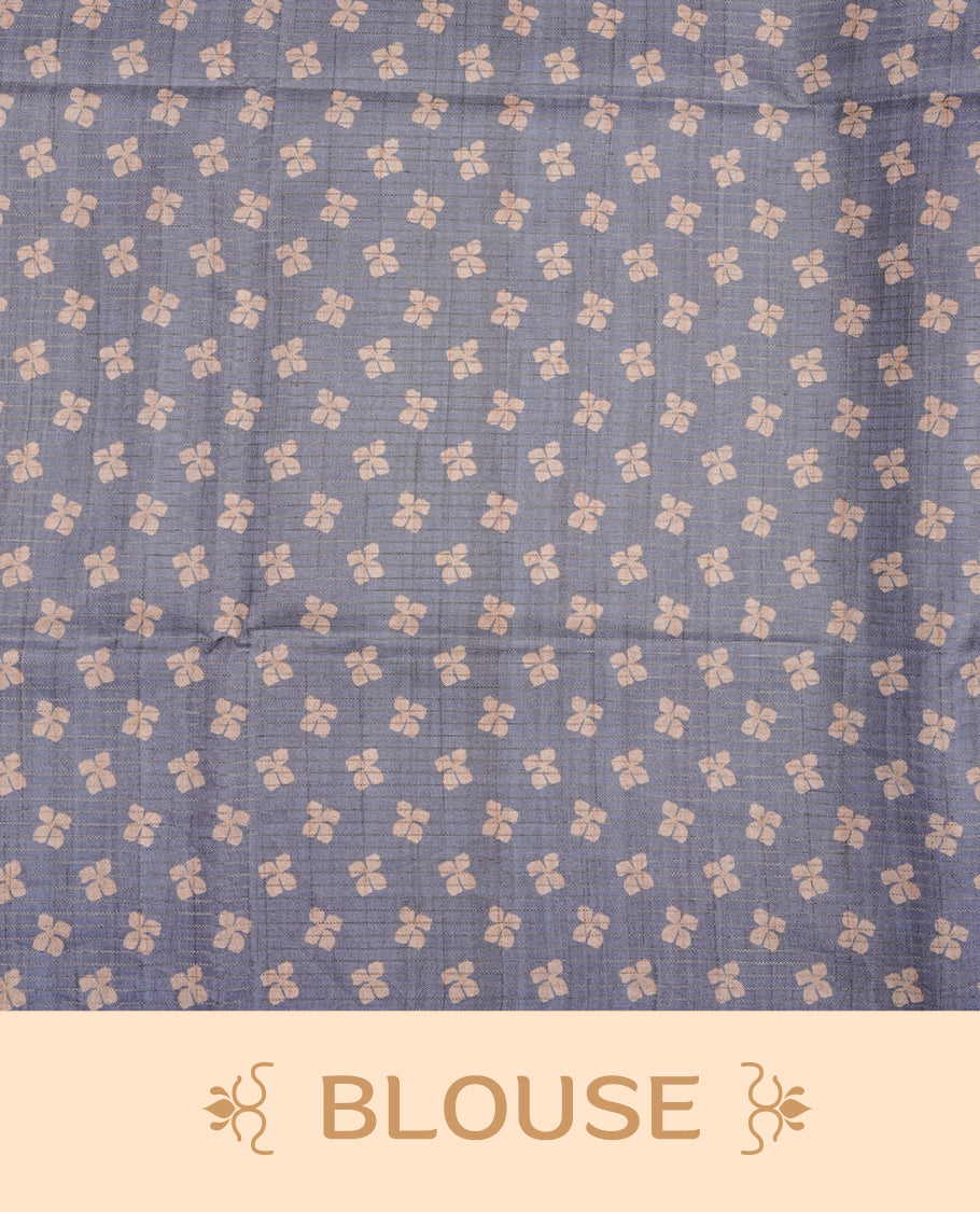 Green colour semi tussar silk saree, featuring subtle hexagonal geometric patterns across the body, a textured pallu with fine detailing, and finished with a matching blouse.