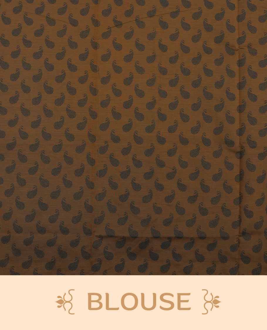 Brown colour poly cotton saree with black floral butti motifs on the body, paired with a matching pallu featuring black ornate floral jaal and stripes on the border, and a coordinated all‑over black paisley printed blouse piece.