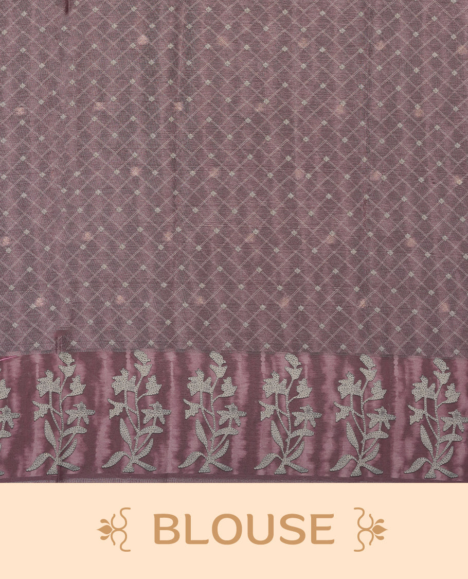 Light Rose copper colour semi tussar saree adorned with Cream strip printed pattern across the body and Floral pattern contrast rose copper colour on border, paired with a matching blouse.