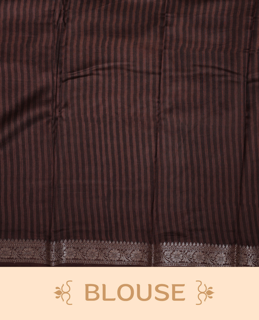 Cream colour chanderi silk saree with Brown& pink geometric stripped printed On body, compilmented by contrast chocolate brown colour border with golden zari floral pattern and a matching blouse.