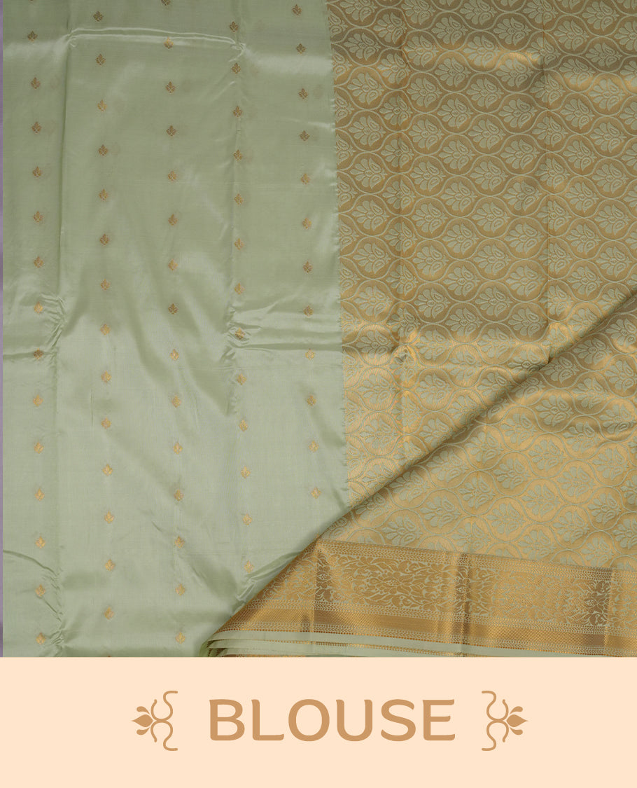 Pista colour shirt and dhoti with gold colour border, paired with matching colour silk saree featuring gold zari buttas and traditional border paired with matching blouse piece.