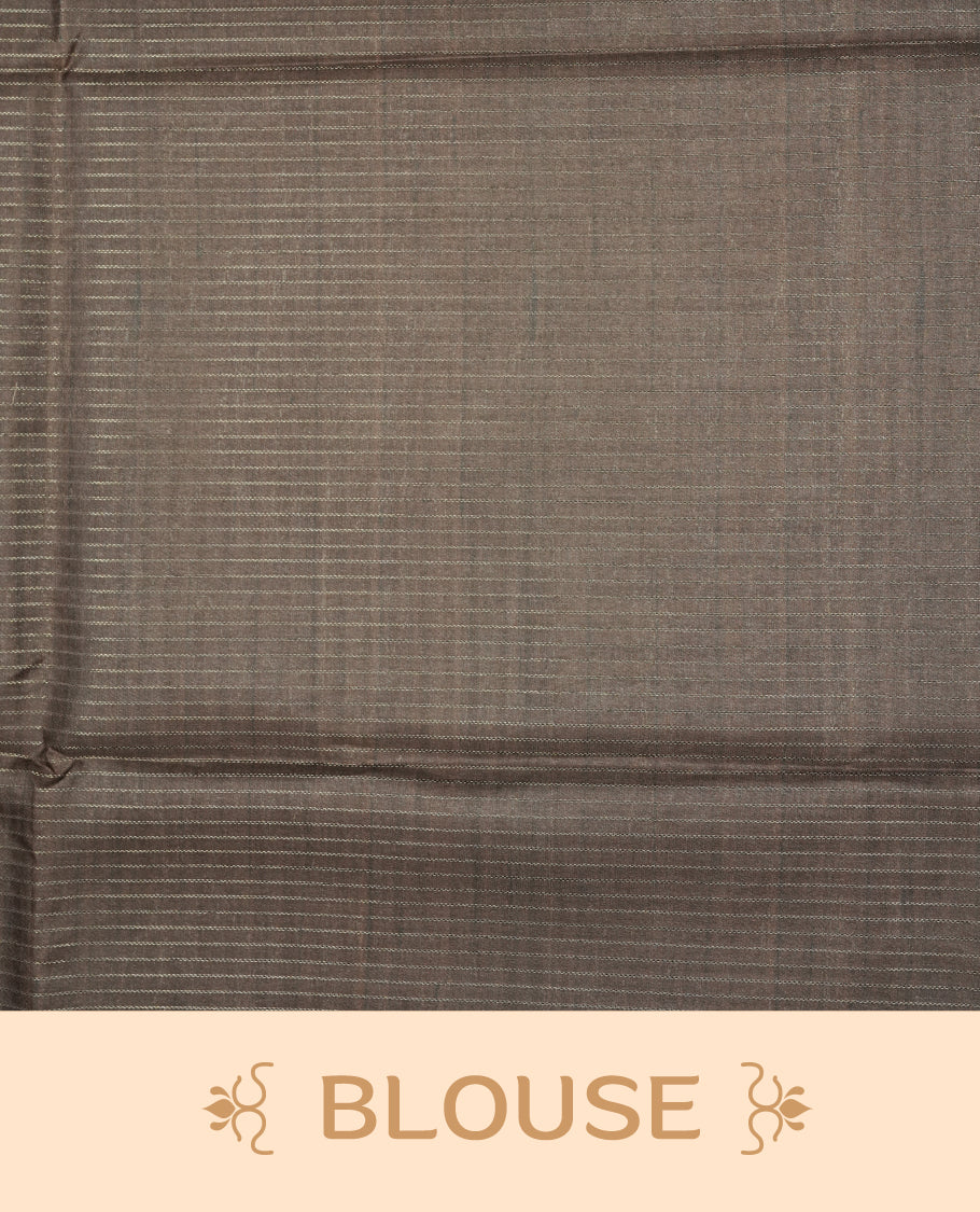 Charcoal Brown colour semi tussar silk saree crafted in breathable cotton, featuring subtle striped textures across the body, a minimalist pallu with fine linear detailing, and a coordinated plain blouse piece.