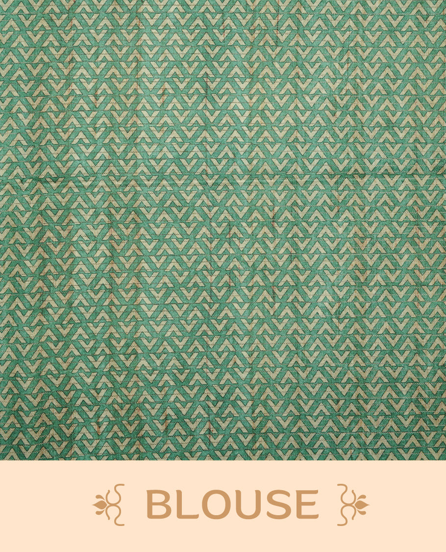 Green colour semi tussar silk saree featuring zigzag print and zari check pattern across body, self colour border with geometric pattern and pallu, paired with matching blouse piece.