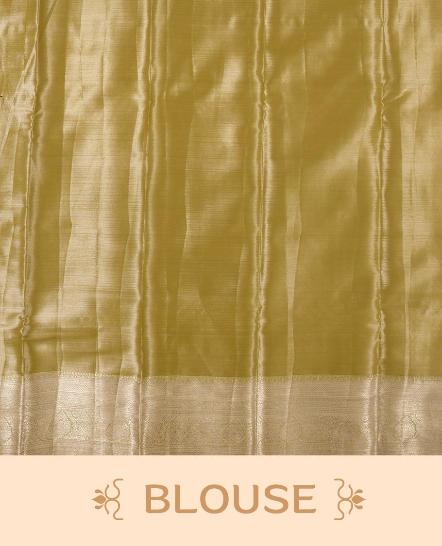 Light olive-gold antique zari tissue brocade saree with delicate woven floral motifs, a traditional gold zari border and pallu, paired with a matching blouse.