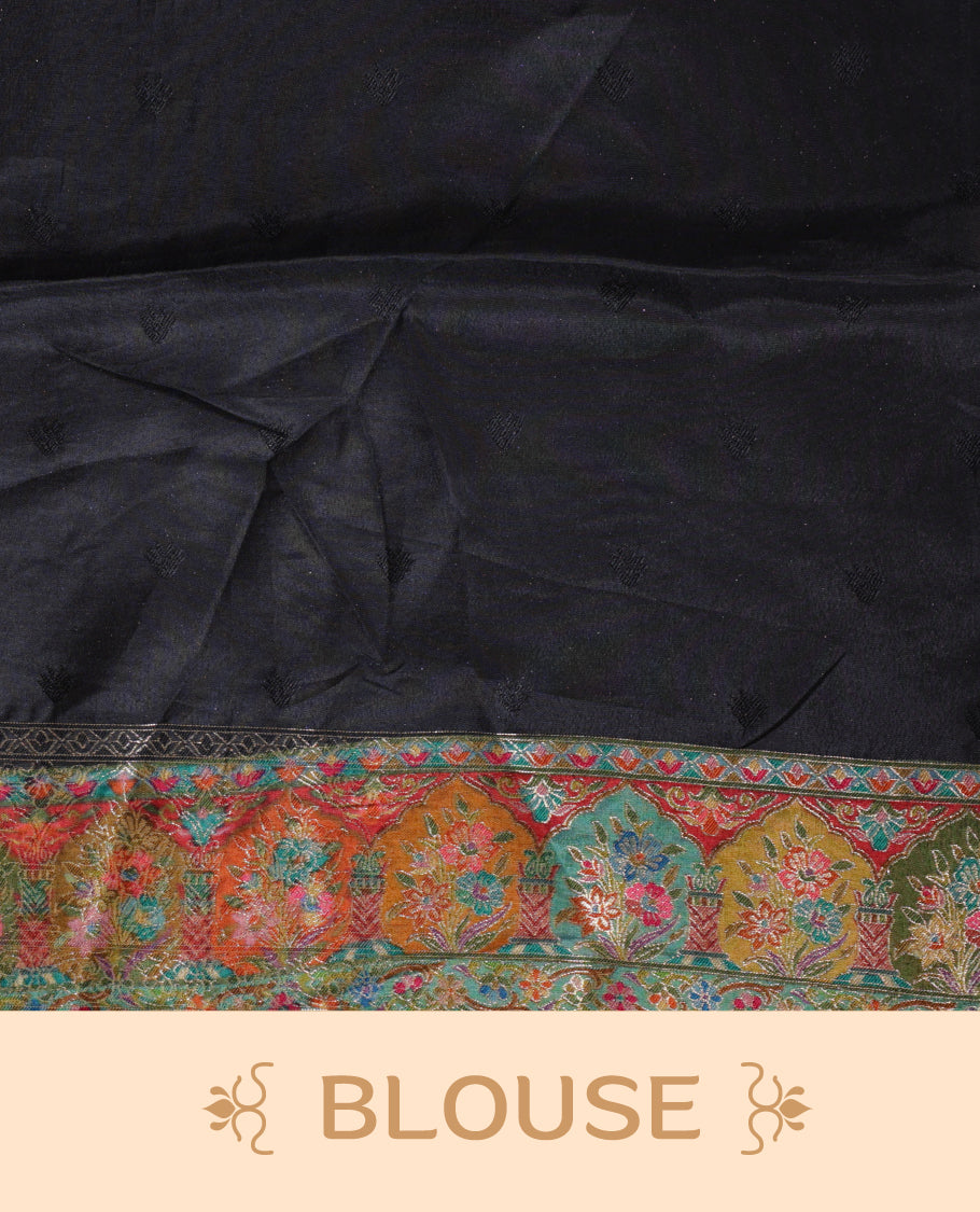 Black colour Pashmina silk saree densely woven with intricate multicolour floral and architectural motifs across the body, framed by an opulent arabesque border and grand storytelling pallu, paired with a matching black woven border blouse piece
