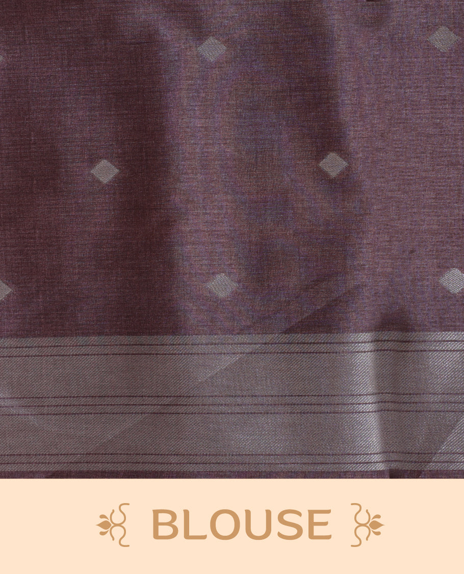 Cream and silver gold dual tone colour semi tussar saree featuring woven abstract geometric motifs on the body, complemented by a ikat inspired patterned brown pallu, paired with a matching blouse.