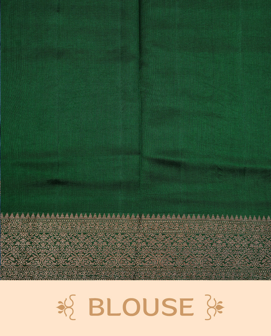 Green Colour Pure Banaras Soft Silk saree featuring Antique Zari buttas in body, complemented by zari work on self colour border, paired with matching Blouse Piece.