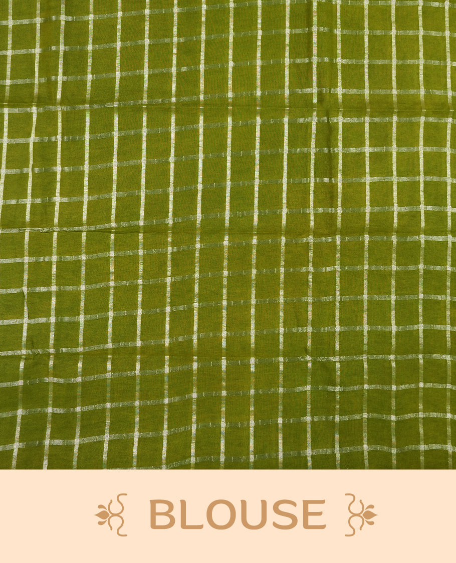 Olive green colour Chettinad cotton saree featuring silver checked patterns on the body, accentuated with elegant silver peacock motifs along the border & Comes with a matching blouse piece.