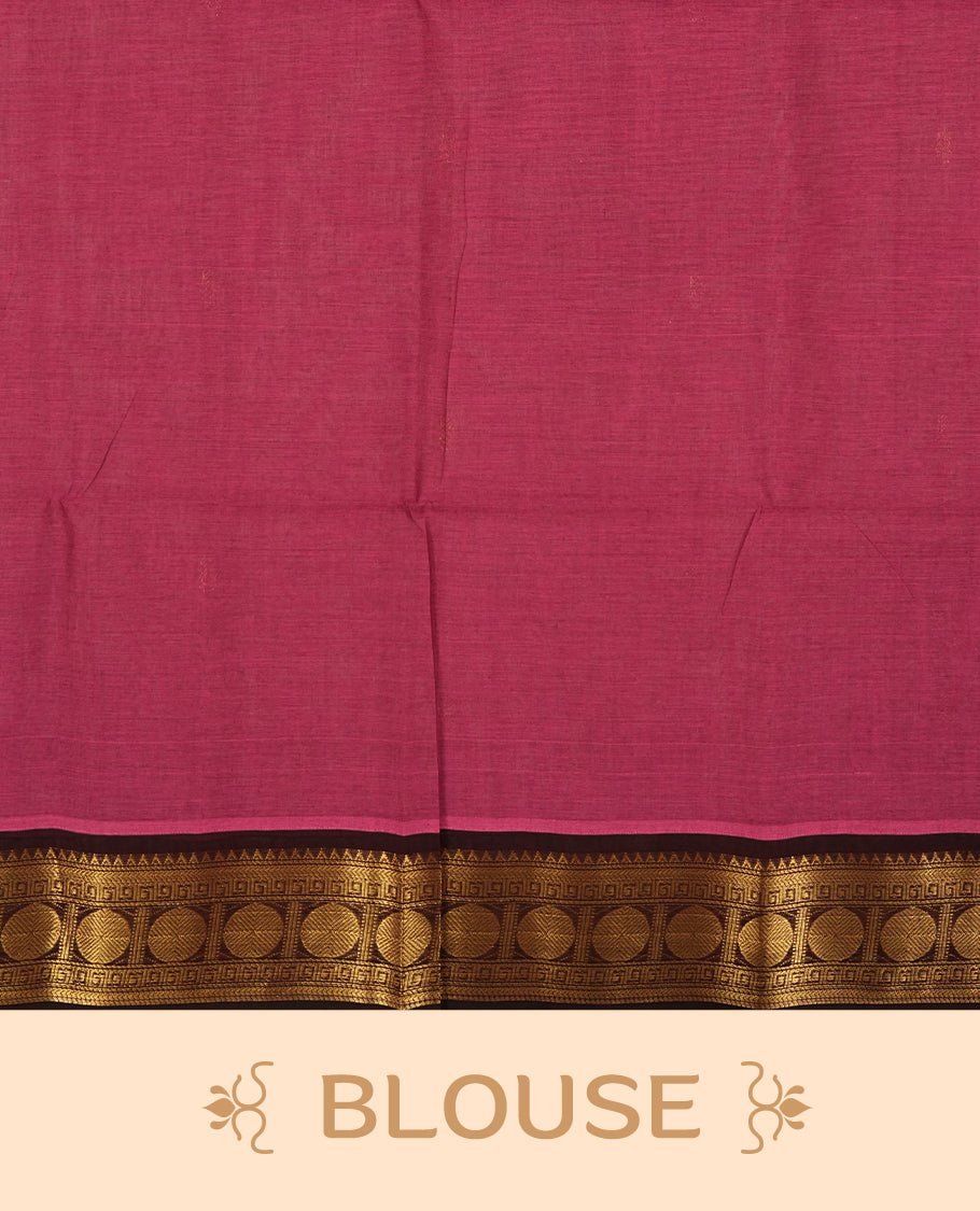 Magenta and Dark wine colour Chettinad cotton saree adorned with a single small woven motif on the body, highlighted by a golden zari border featuring circular patterns and intricate detailing & Paired with a matching blouse piece.