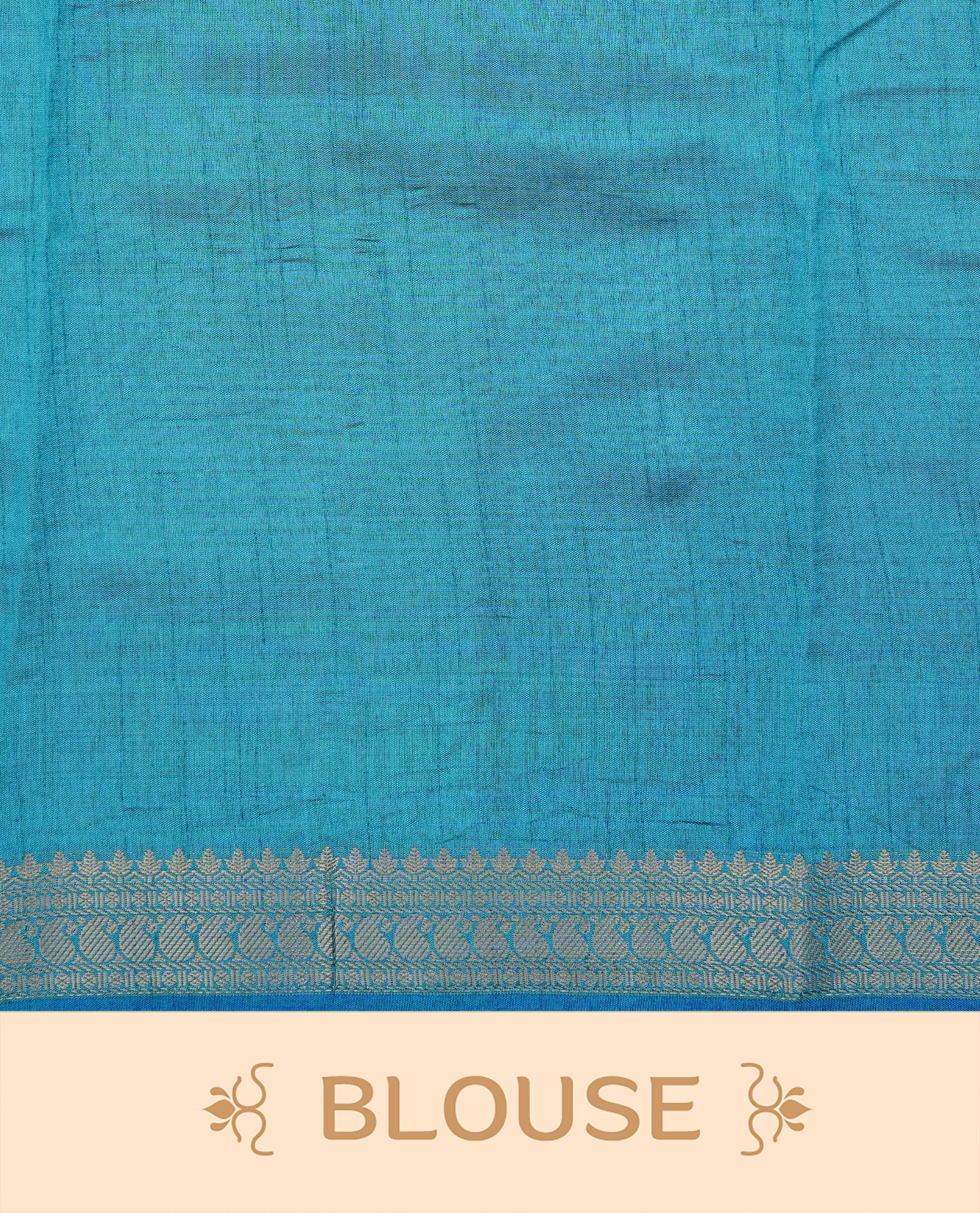 Cream colour Semi Tussar silk saree featuring an elegant plain body, accentuated by a contrast Blue border adorned with intricate gold Mango zari work, paired with a matching blouse piece.