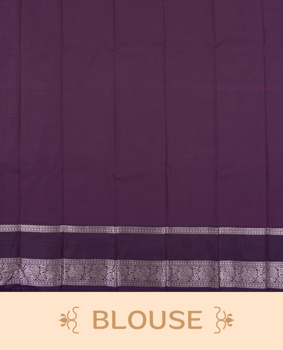 Red colour Semi Silk Saree with rose gold zari patterns on the body, paired with a contrasting Dark violet colour traditional pallu and border, and a matching blouse piece.