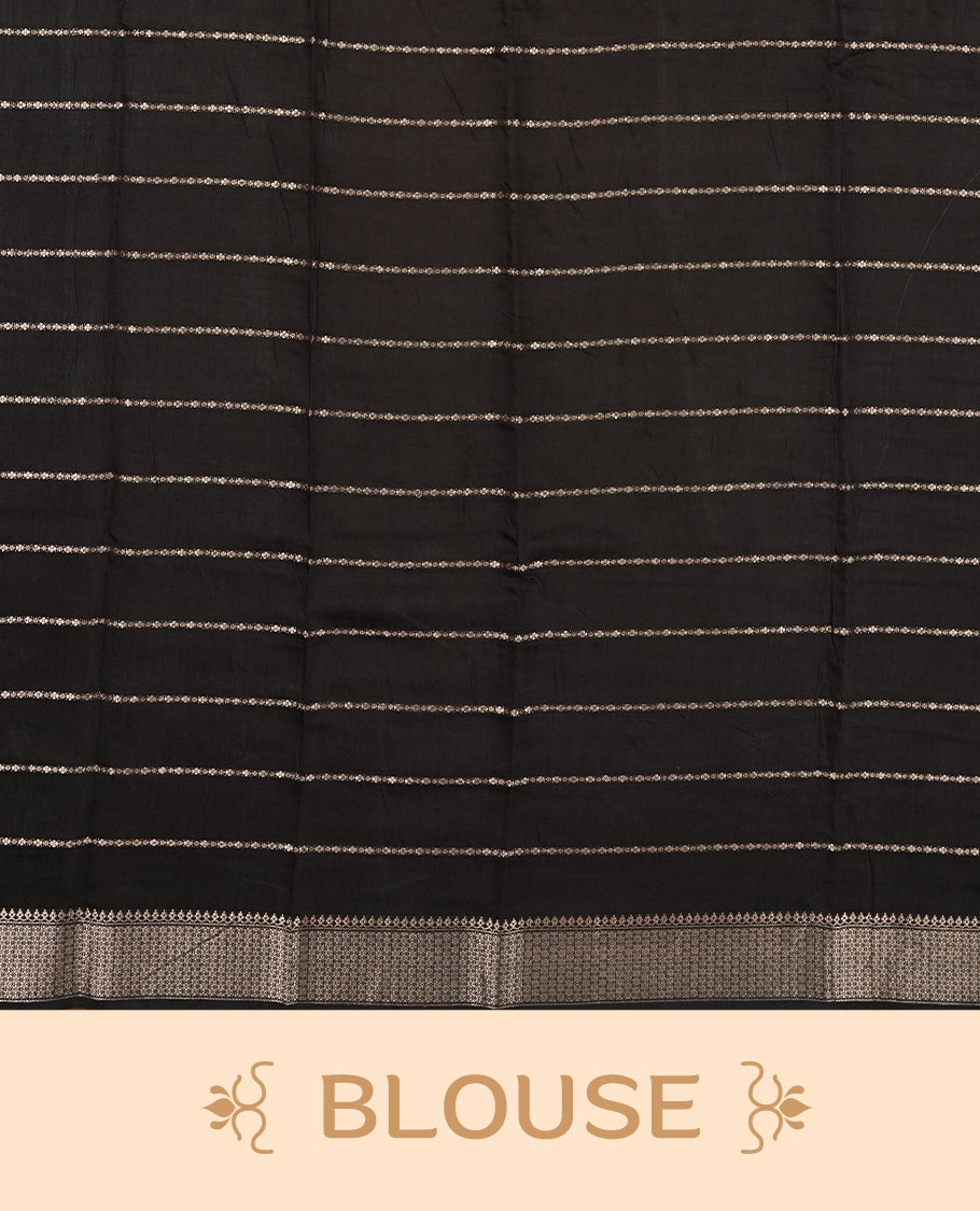 Black colour chanderi silk saree with gold zari strip pattern On body, compilmented by self colour border with antique zari pattern & white animal & forest print pattern and a matching blouse.