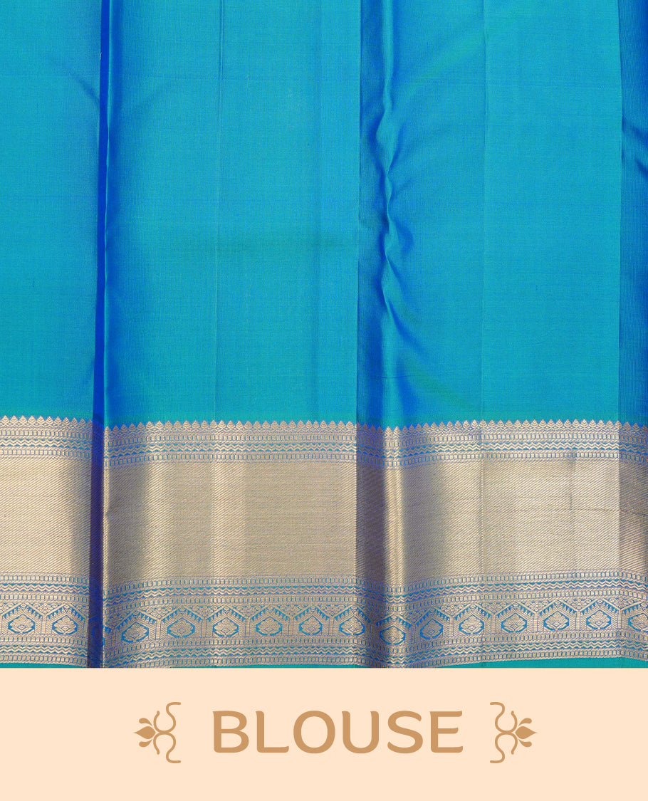Peacock colour pure wedding silk saree featuring Gold zari inside box diamond with peacock motifs pattern on body, complemented by self colour with traditional border, comes with matching blouse piece.