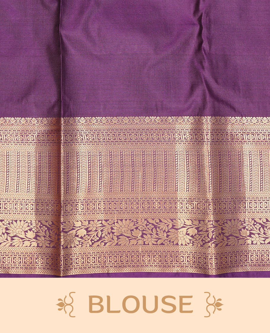 Purple Colour Wedding Silk Saree Featuring Gold zari Designed stripes on body, complemented by traditional Zari pattern on self colour border, paired with matching blouse piece.
