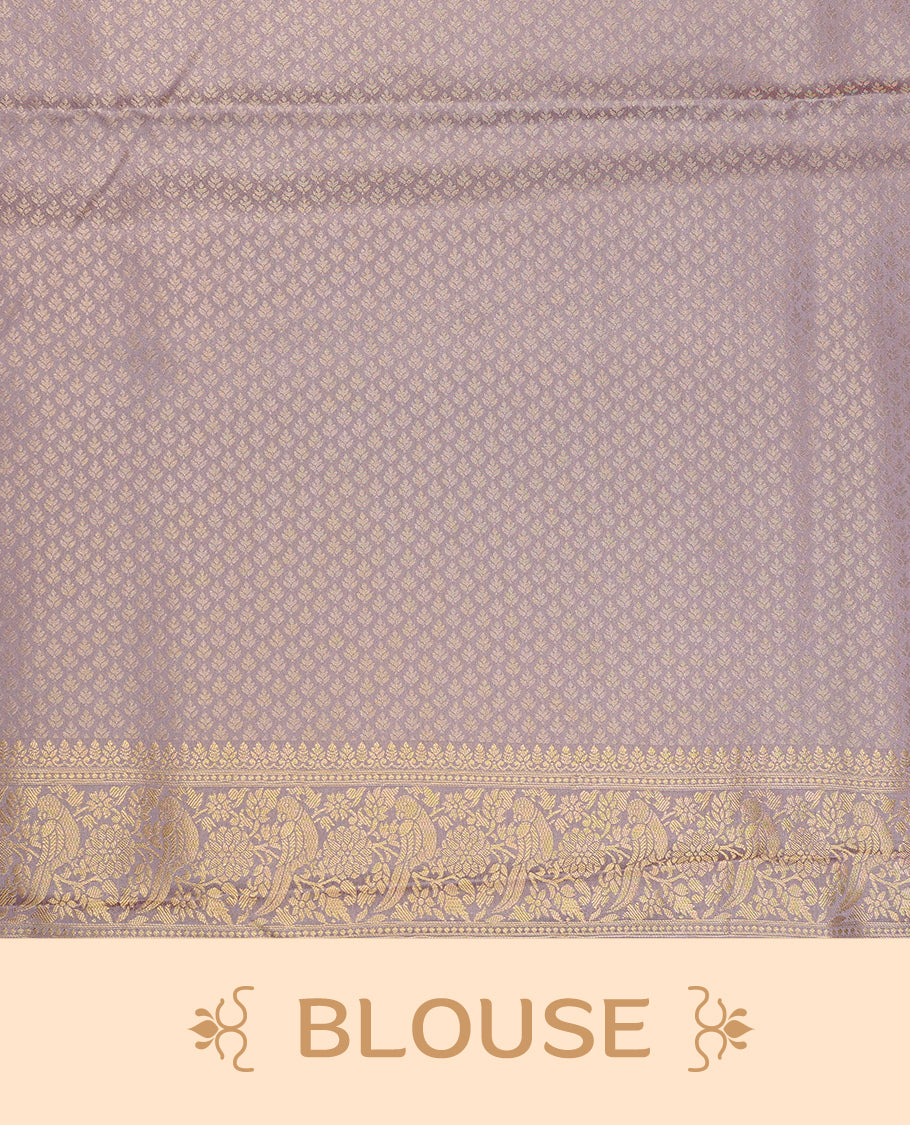 Pastel Lavender colour Mulberry silk saree featuring Gold zari bird motifs on body, complemented by self colour with gold zari border, comes with matching blouse piece.