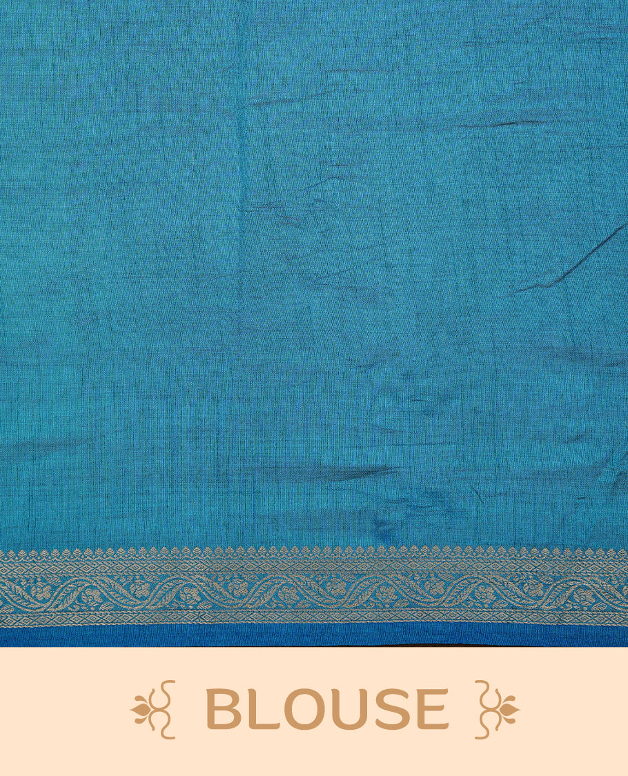 Cream colour Semi Tussar silk saree featuring an elegant plain body, accentuated by a contrast Blue border adorned with intricate gold floral kodi zari work, paired with a matching blouse piece.