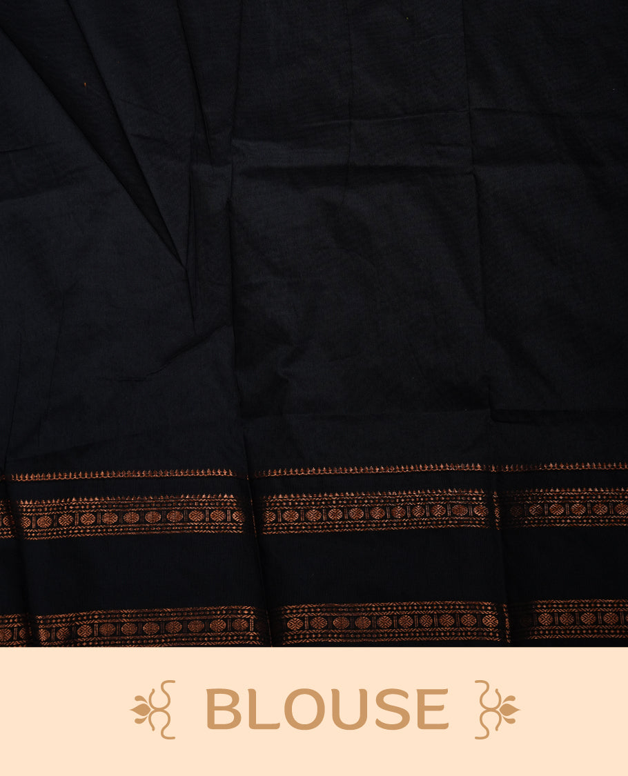 Grey colour Kalyani cotton saree featuring a plain elegant body, complemented by a black zari border and traditional woven pallu, paired with a matching blouse.