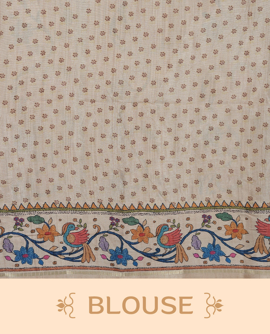 Gray colour semi tusser silk saree featuring gold zari check pattern with floral butti motifs, with contrast floral kodi & bird pattern and paired with matching blouse.