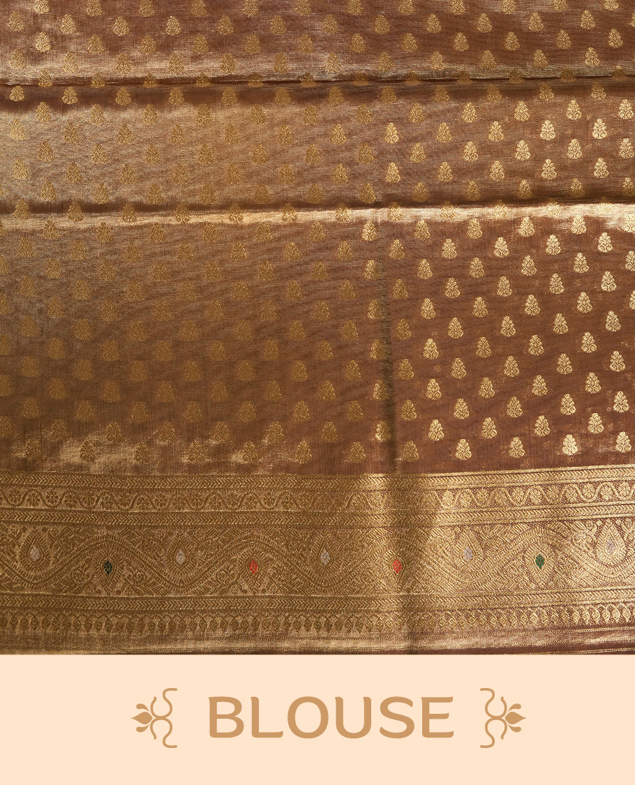 Antique gold colour tissue banaras silk saree featuring antique gold zari motifs on the body with rich traditional zari border and pallu, paired with a matching blouse piece.