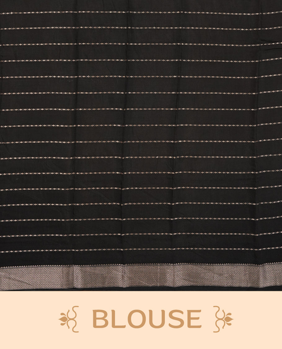 Black colour chanderi silk saree with gold zari strip pattern On body, compilmented by self colour border with antique zari pattern & white peacock & kodi print pattern and a matching blouse.