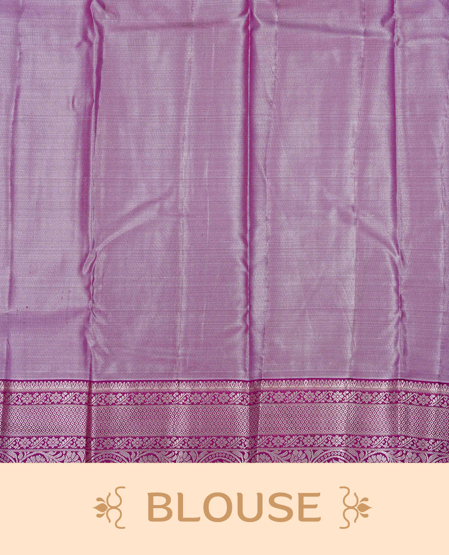 Lavender colour Semi tissue silk saree featuring Light gold zari kodi floral motifs on body, Contrast Purple colour with traditional border, paired with matching blouse piece.
