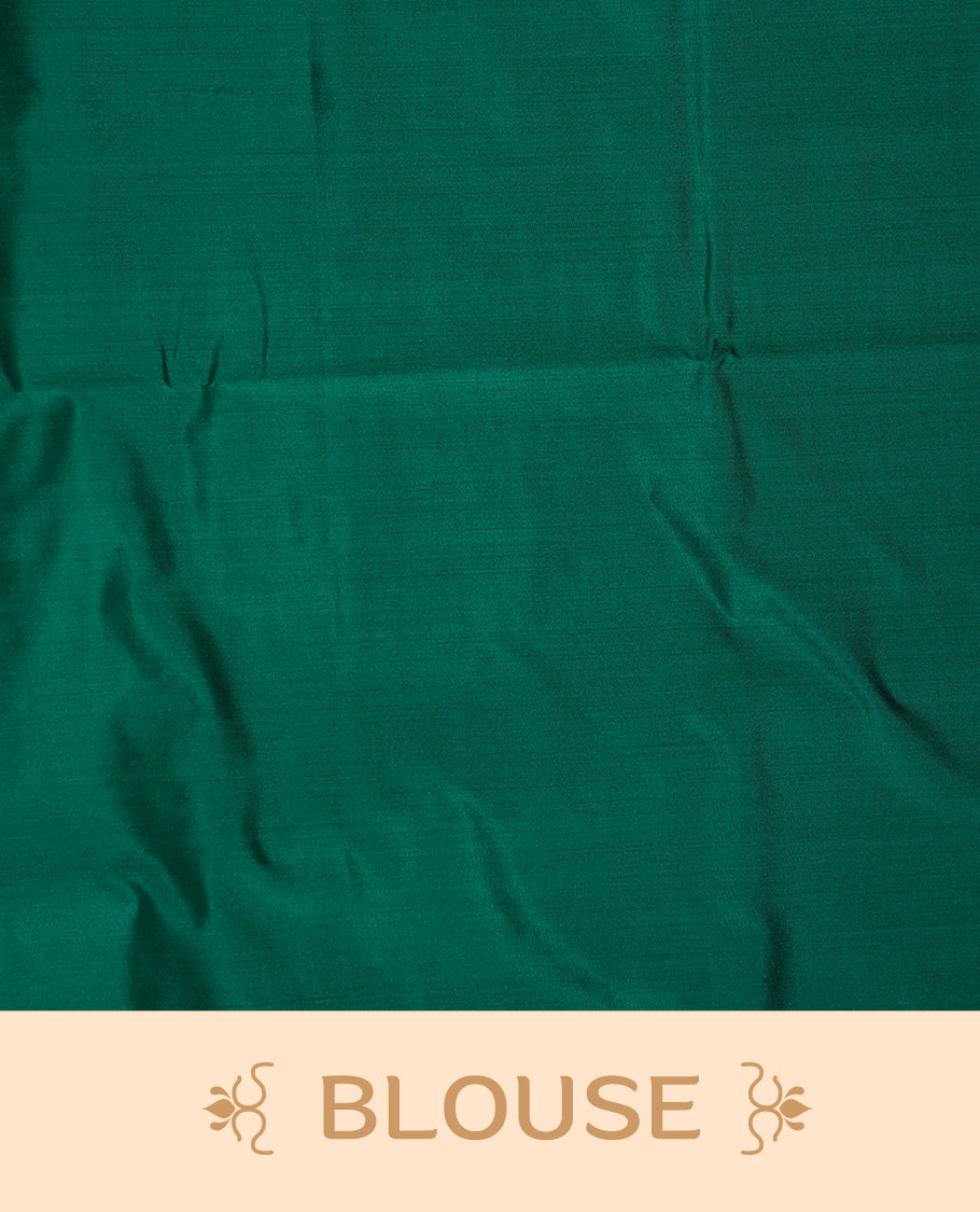 Maroon colour soft silk saree featuring Antique zari motifs on body with Highlighting contrast green colour pallu and paired with matching blouse piece.